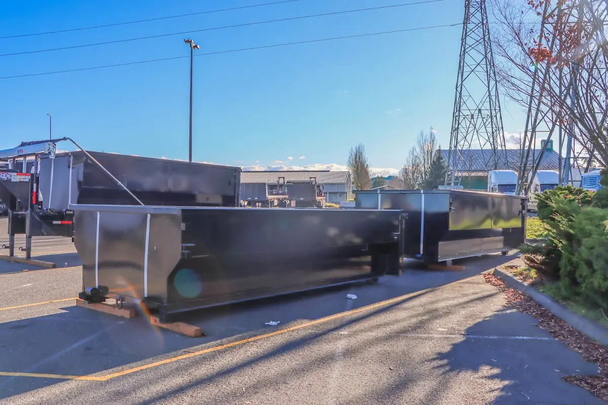 Roll-off dumpster ready for waste disposal at job site for Construction Dumpster Rental in Bryn Mawr-Skyway